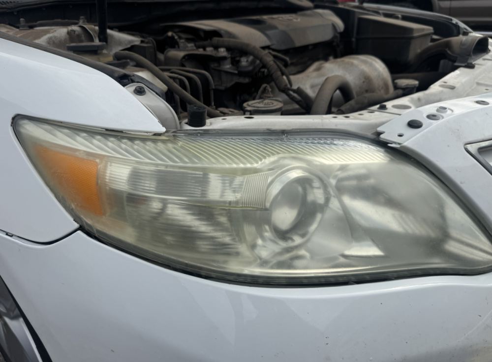 Toyota Camry headlight before restoration — Stay Bright OKC