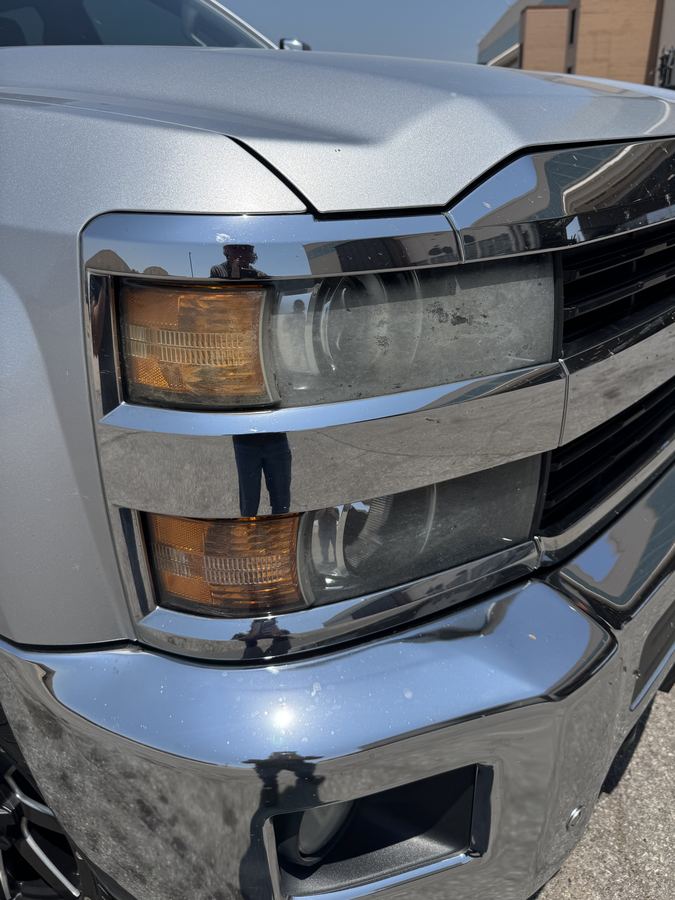 Chevy Silverado headlight before restoration — Stay Bright OKC