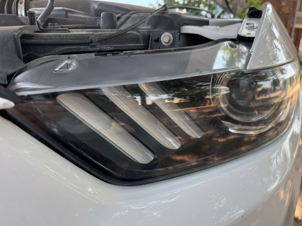 Ford Mustang headlight after restoration — Stay Bright OKC