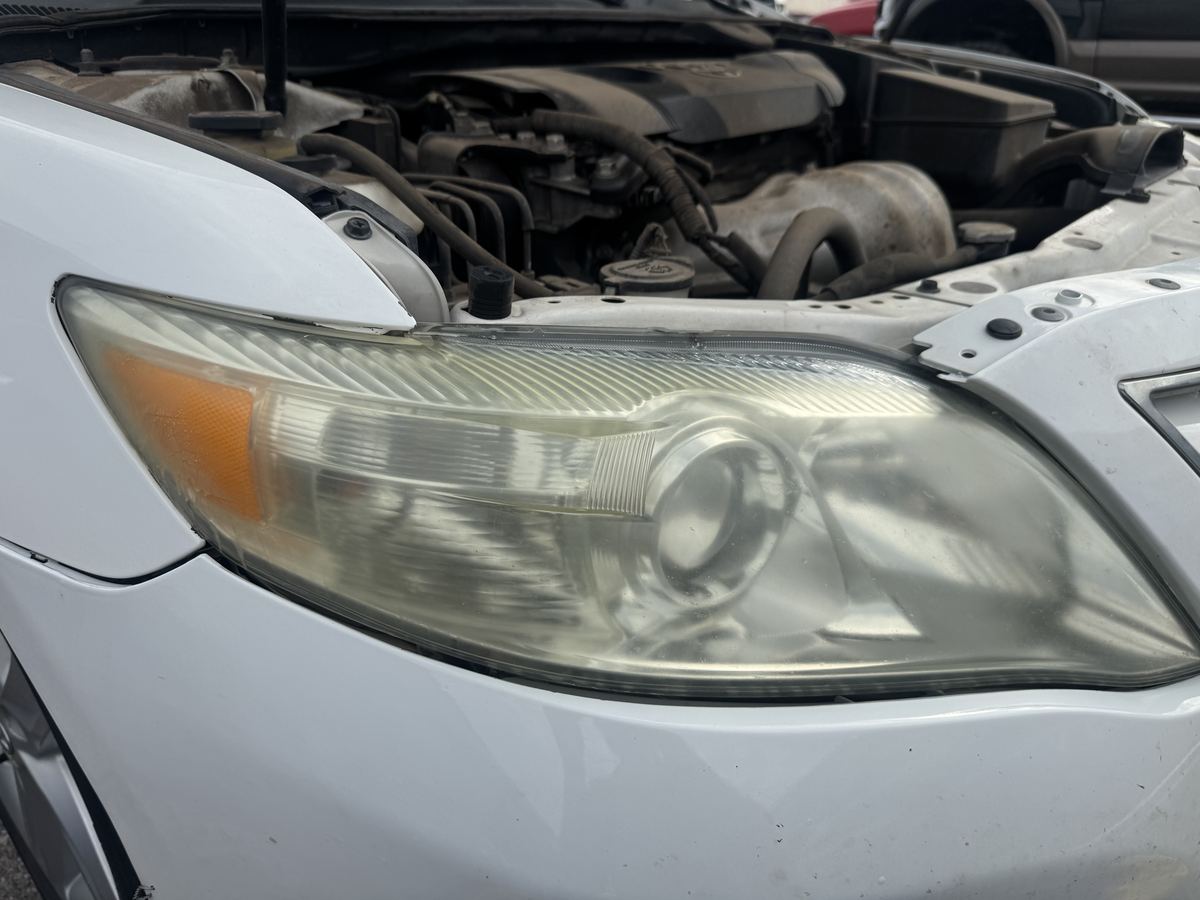 Toyota Camry headlight before restoration — Stay Bright OKC